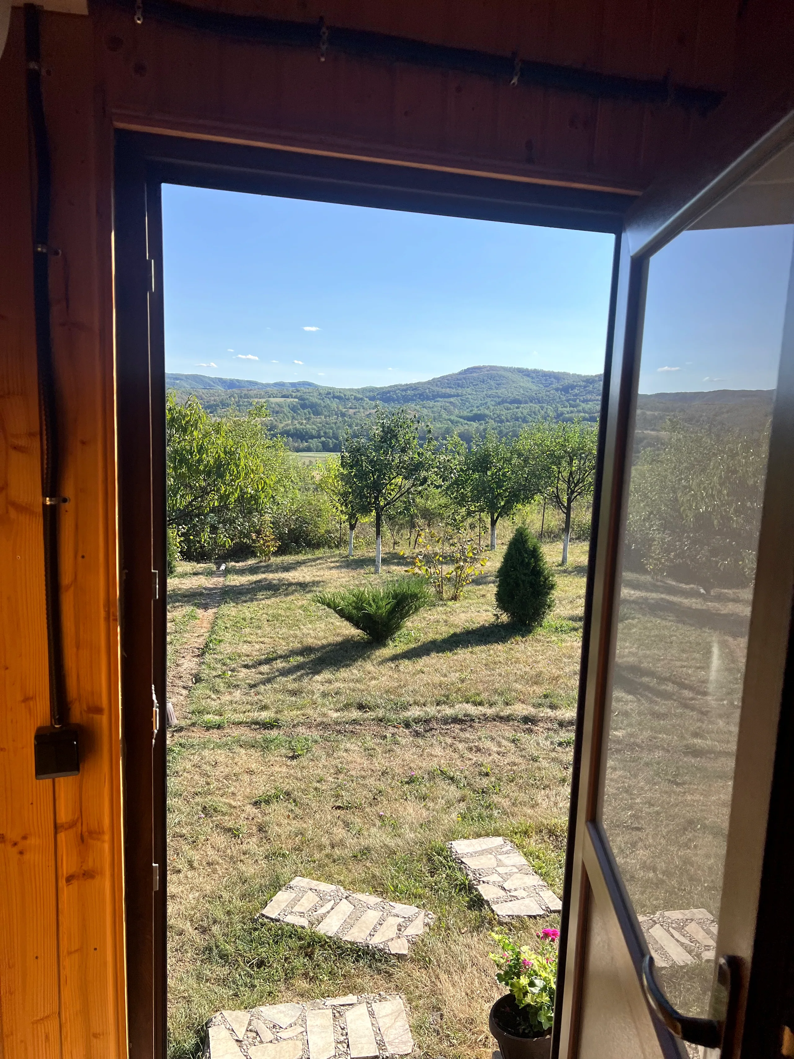 Mountain view through an open doorway